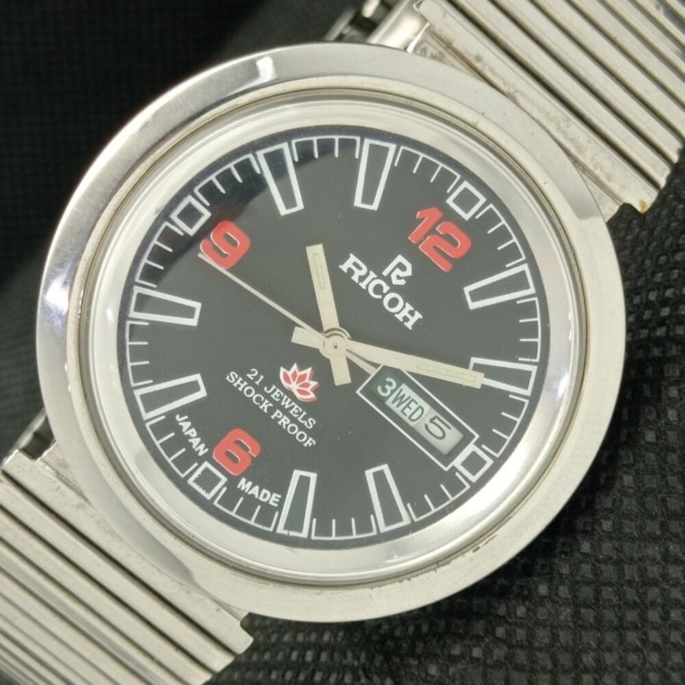 Vintage 1978 Ricoh Automatic Mens Silver Watch W/daydate & Red accents